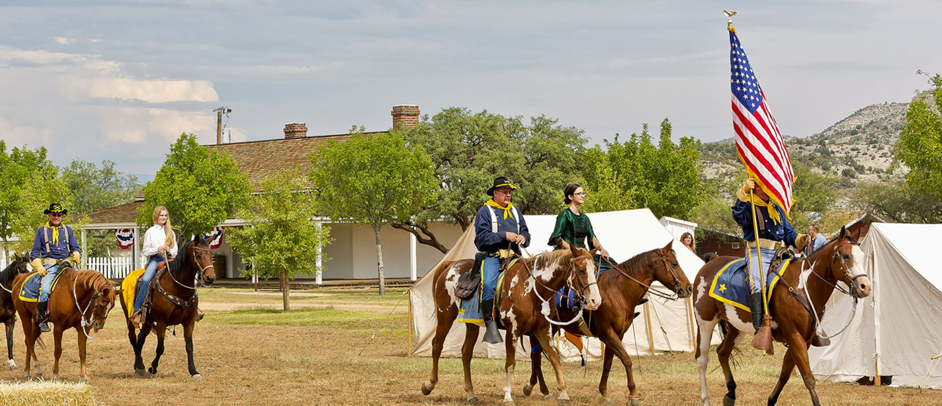 A horse procession during Fort Verde Days at the park