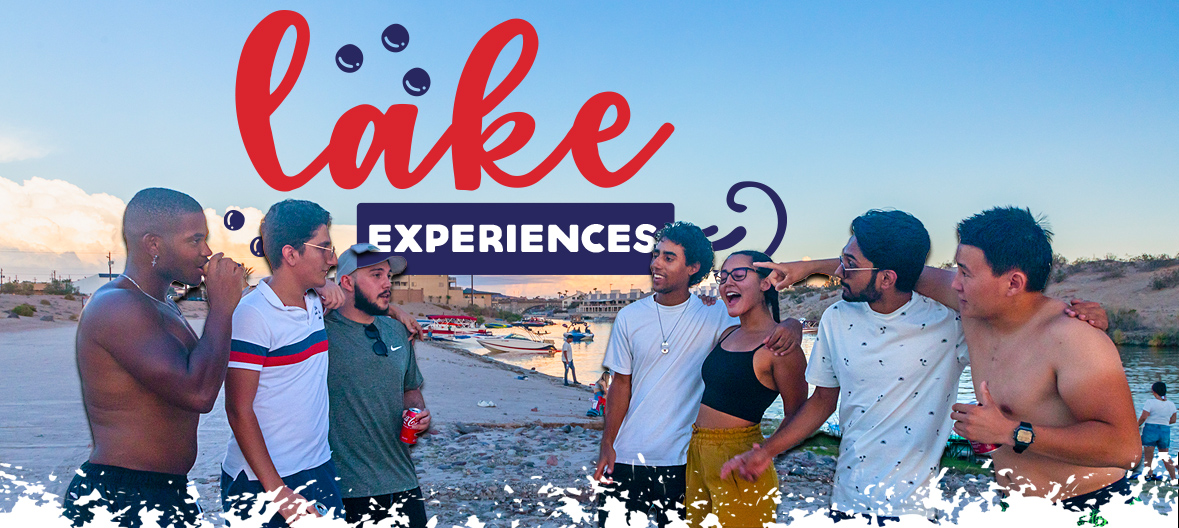 Group of ASU students talking on the shore of Lake Havasu 