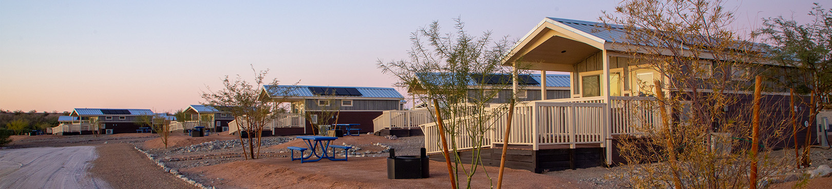 Lakeshore cabins at Havasu illuminated by a western Arizona sunset.