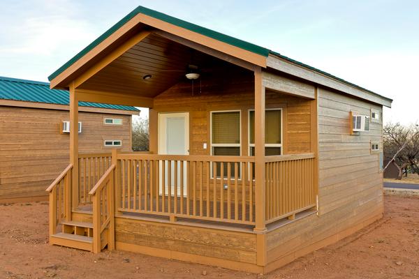 Front view of one of the southern Arizona cabin rentals on a sunny day and bluebird skies.