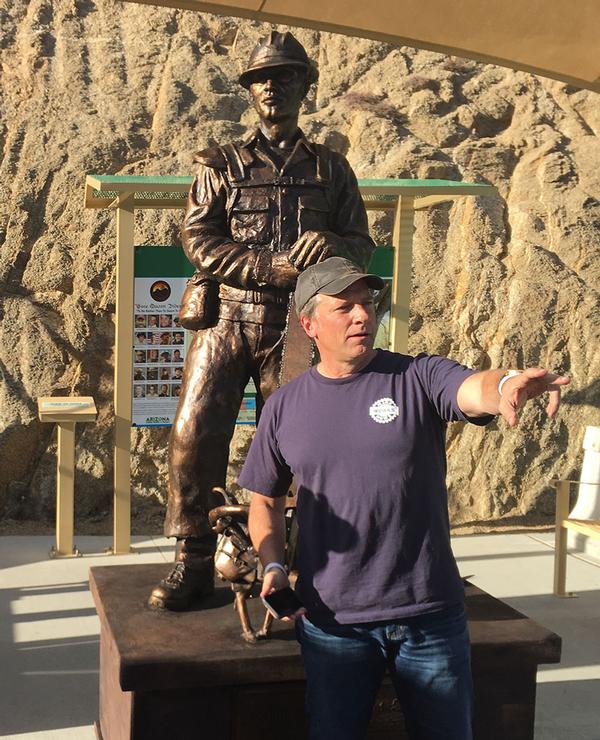 Mike Rowe at the park directing placement of the statue