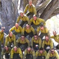 The Hotshots pose at the juniper tree prior to their deaths