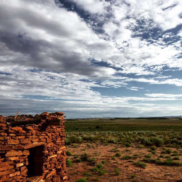 A view of the sweeping sky above a Hopi pueblo ruin at Homolovi State Park.