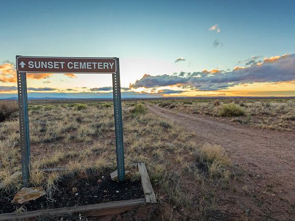 A road sign leading into Sunset Cemetery Arizona