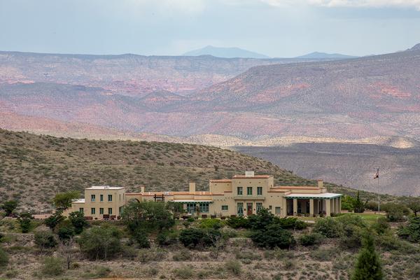 The Douglas Mansion is a great historic site in Jerome, AZ with a view of the town on the hill and mining equipment.