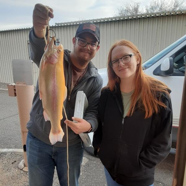 Successful anglers with a nice looking Roper Lake albino rainbow trout!