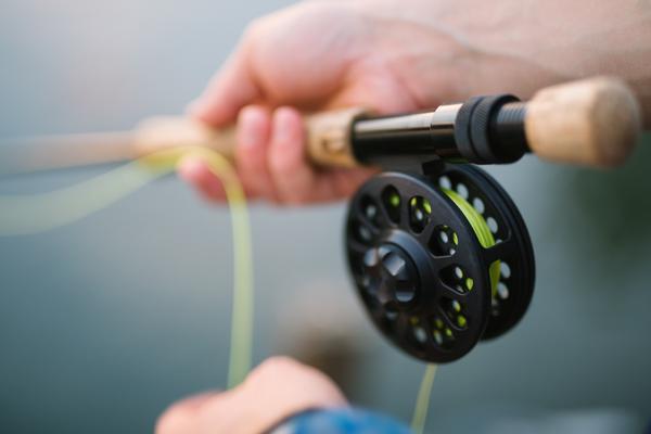 A photo of a reel and rod