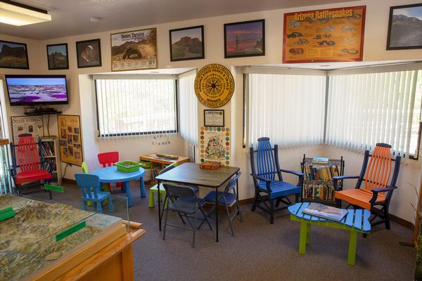 The children's area with chairs and tables in the Patagonia Lake visitor center