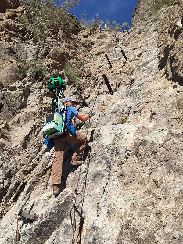 Ranger Ken and the Google Trekker make their way up to Picacho Peak using cable guides