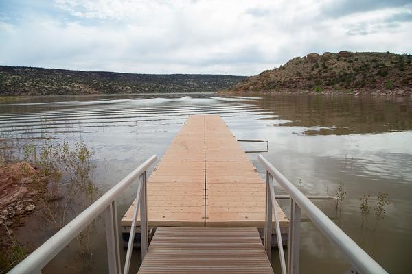 A pier leading to the water in the White Mountains at Lyman Lake, AZ