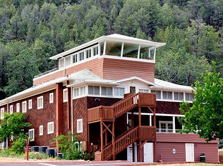 The three-story Goodfellow Lodge near the entrance of the park