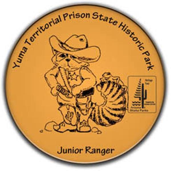 Junior Ranger Button for Yuma Territorial Prison State Historic Park, featuring Rocky Ringtail
