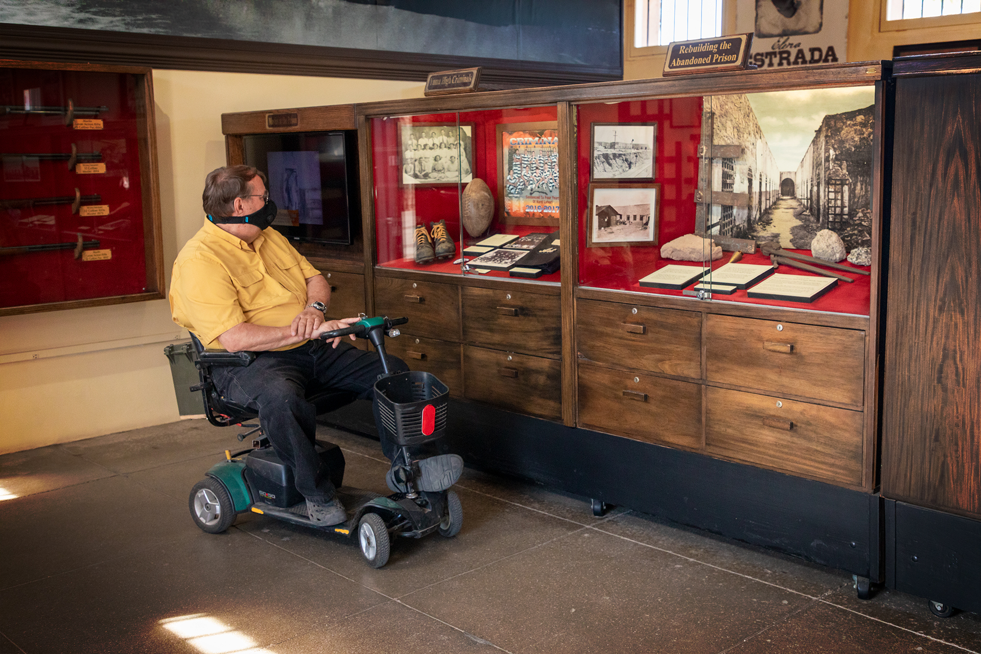 A man explores the exhibits in the park museum