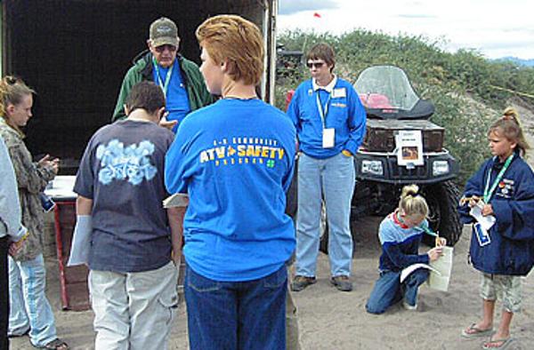 A group of people learning during an OHV Training