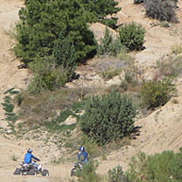 Two dirt bikes backcountry OHVing