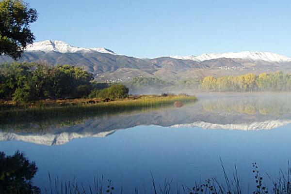 Dead Horse Ranch waterfront Mountains topped with snow behind the lagoons at Dead Horse Ranch